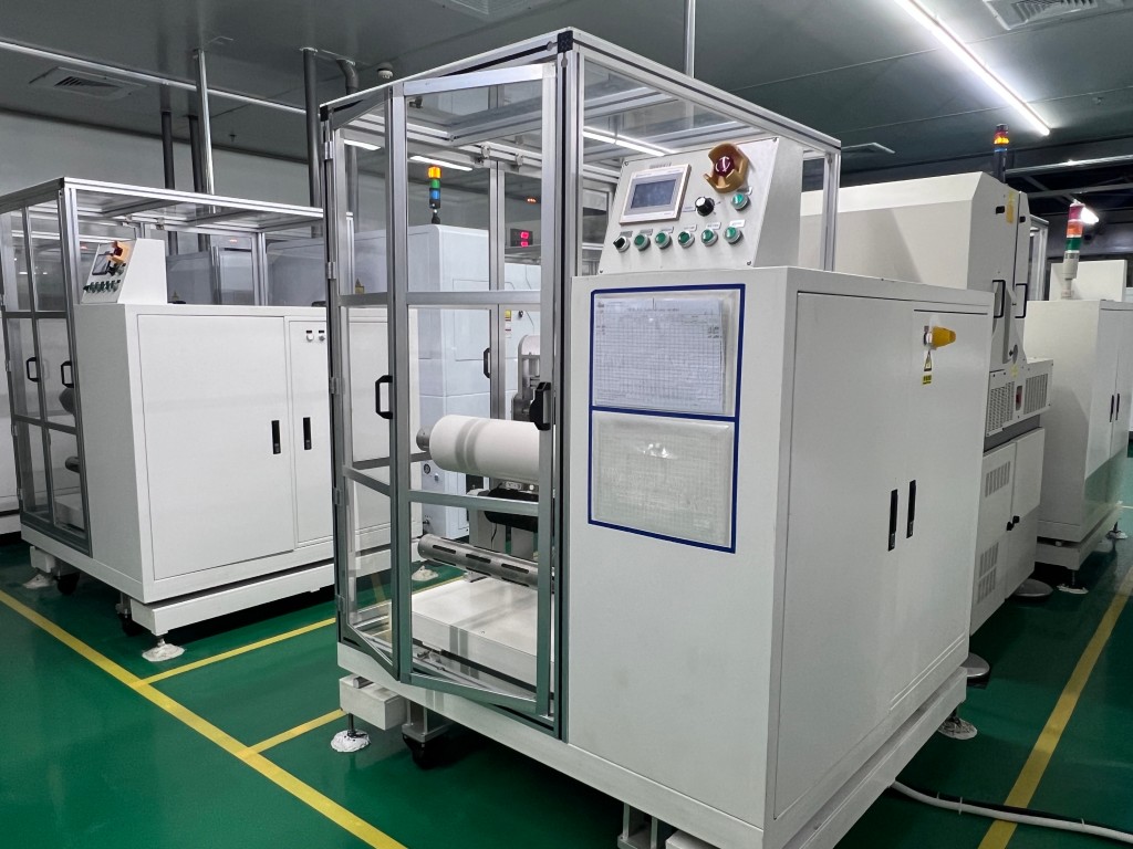 Roll-to-roll UV Drilling Machine